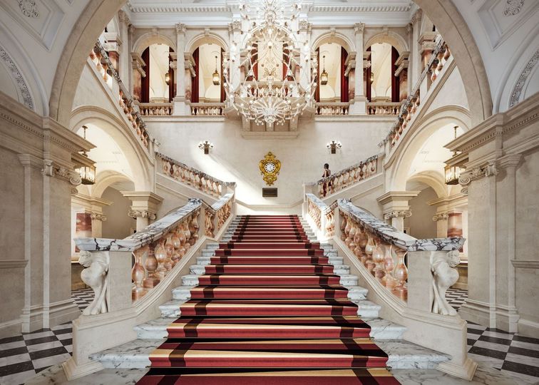 A rendering of the grand staircase s it will appear at the heart of the historic OWO building when Raffles finishes renovating later this year.