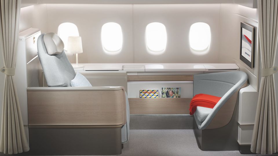 Elegant curtains frame Air France's current 777 La Premiere first class suite.
