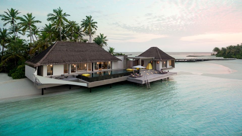 The Randheli Villa sits on the shoreline.