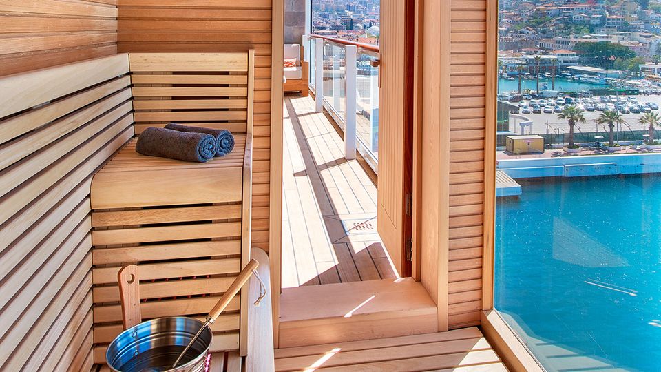 Relax in the dry, glass-enclosed sauna.