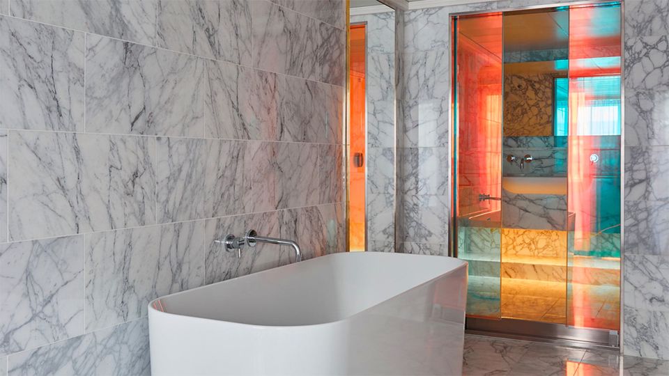 Dichroic glass adds personality and color to the suite.
