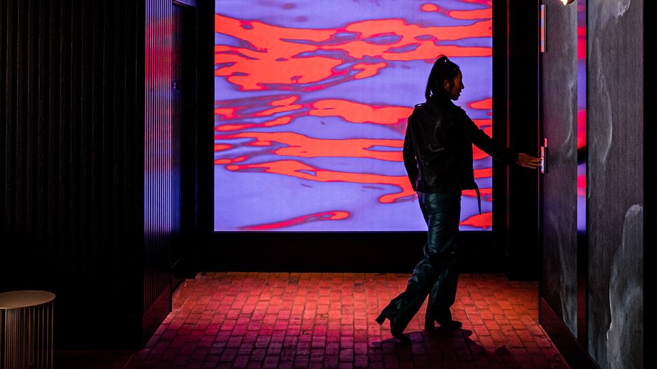 Psychedelic colours set the tone at the hotel's elevators.
