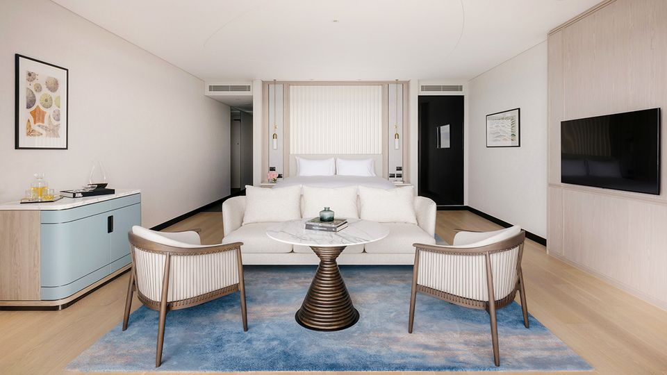 The Executive Ocean Suite includes a marble bathroom and attractive seating area.