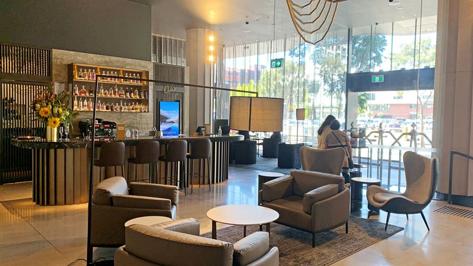 Marriott Docklands' lobby is an inviting space with a small bar while waiting to check-in.