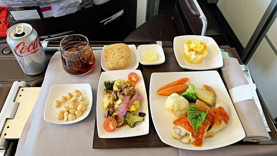 Meal orders are taken prior to take-off and arrive once cruising altitude is reached.