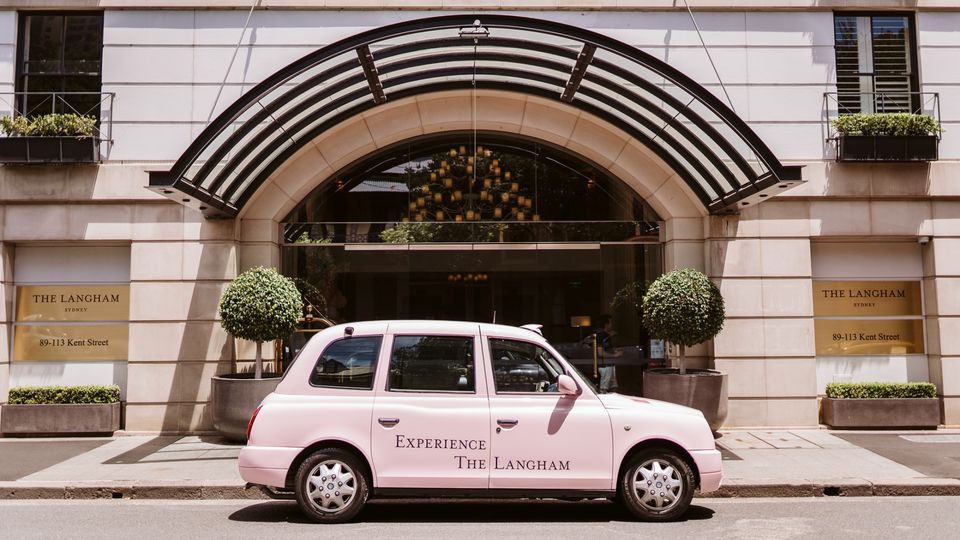 The Langham's pink taxi is an instantly recognisable hallmark.