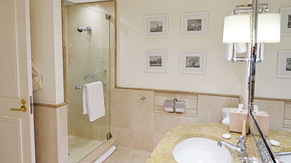 Elegant marble was the dominant feature of the bathroom.