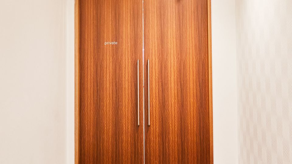The secret VIP-only lounge is hidden behind a nondescript door marked 'Private'.