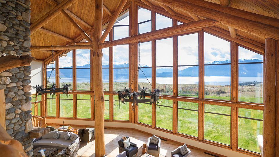 The lodge's open interiors are designed to reflect the vastness of Fiordland National Park.