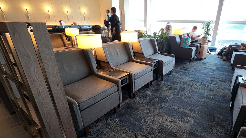 Armchairs have convenient at-seat USB and AC power outlets.