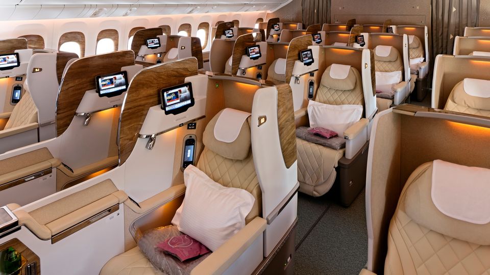 Business class on Emirates B777-200LR is a 2-3-2 layout across most of the cabin.