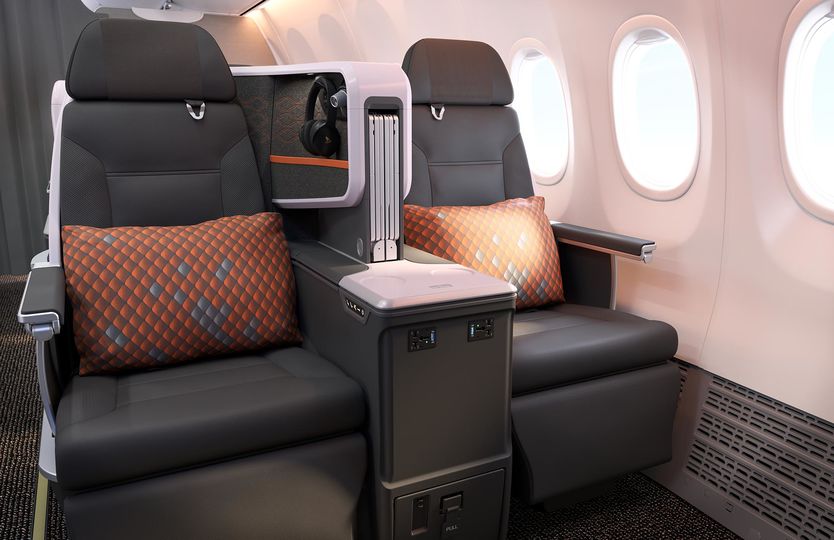 Singapore Airlines' Boeing 737 MAX business class seats subtly pick up the airline's colour palette.