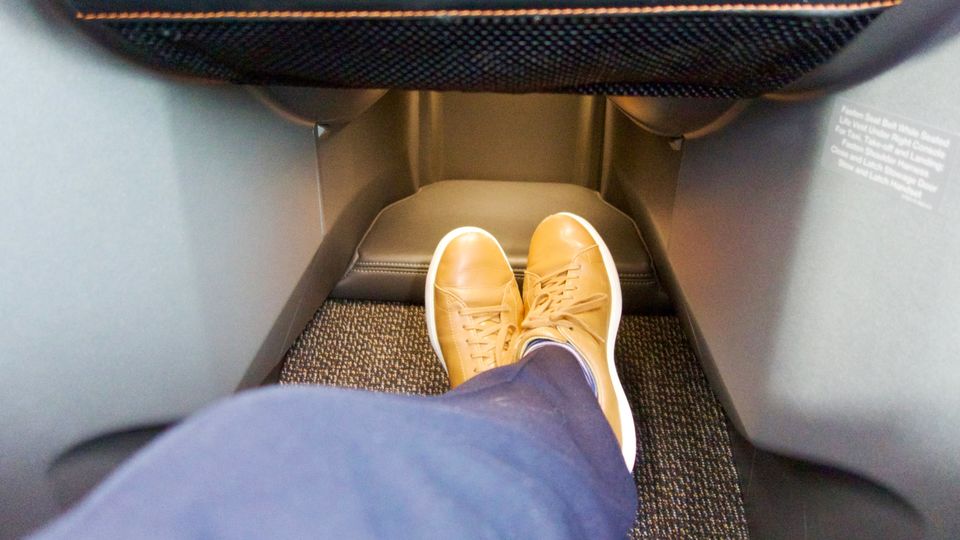 There's less room for your feet in the smaller cubby of rows 12 and 14.