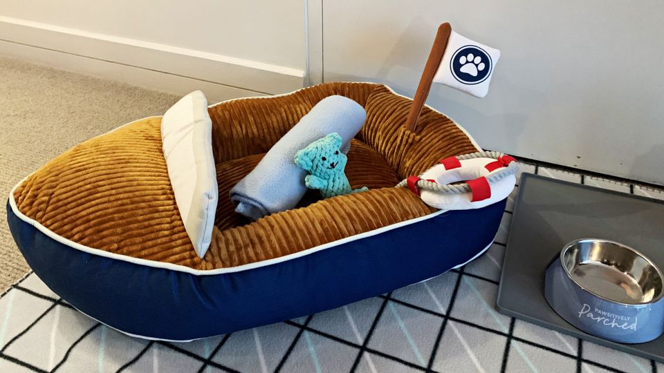 Your pup will feel the wharf vibes in this nautical bed.