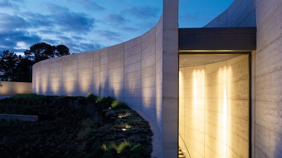 The monumental, rammed-earth walls are beautiful from every angle.
