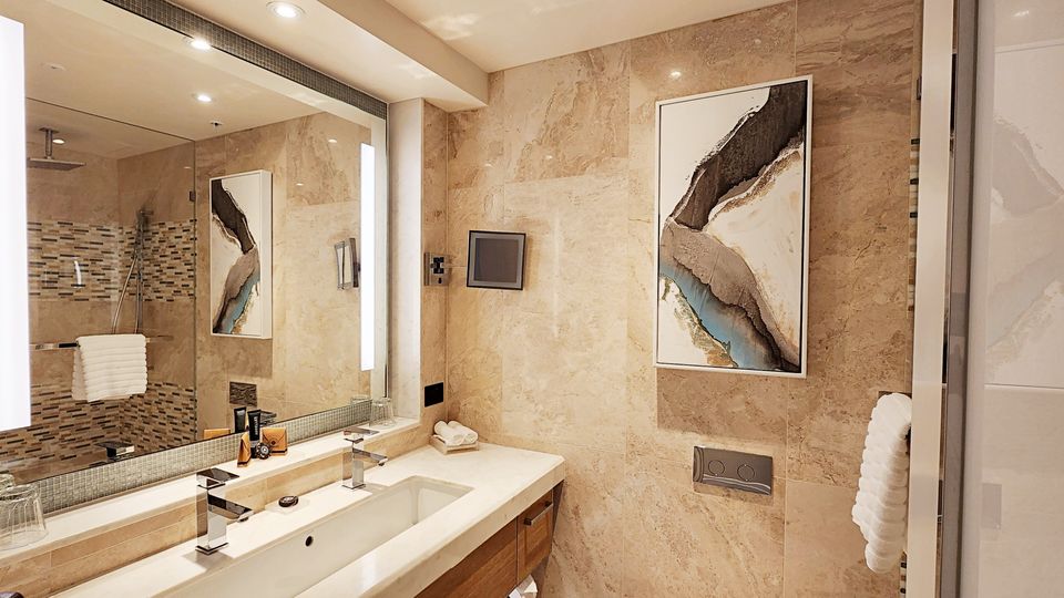 The marble bathroom featured plenty of space for your personal effects.