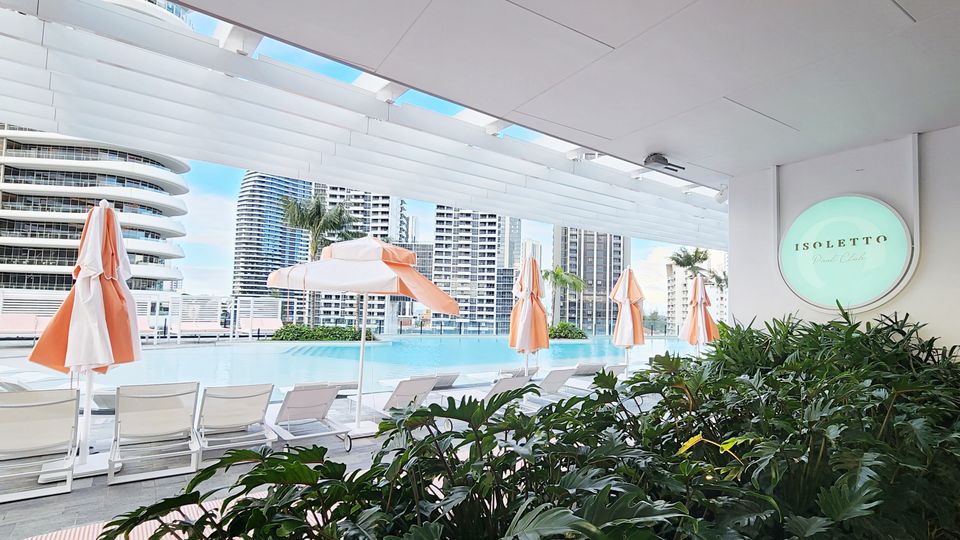 Isoletto Pool Club overlooks the Gold Coast skyline.