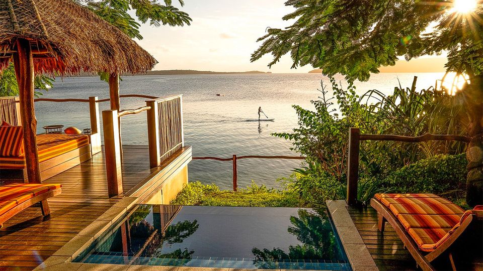 Raise a glass to the sunset in the Waterfront Villa’s private infinity pool.
