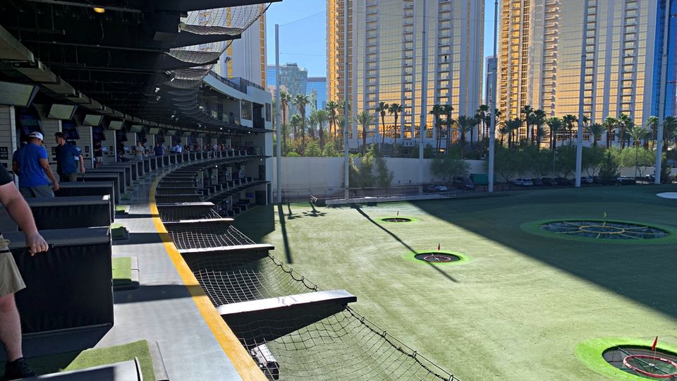 Topgolf has dozens of hitting bays but it's always wise to make a booking.