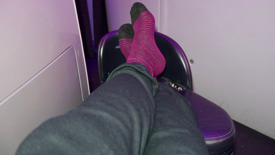 Don your AirNZ socks and stretch out for the long flight ahead.