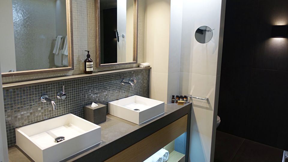 The bathroom features plenty of space for your personal effects.