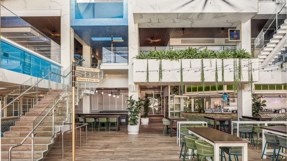 Both of Flynn's swimming pools offer views down to Boardwalk Social, and vice versa.