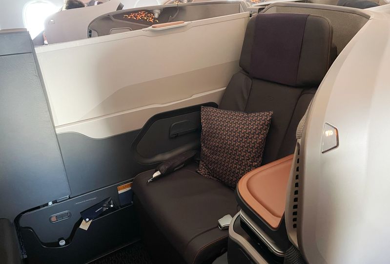 Flying solo in a middle seat? Just slide up the divider.