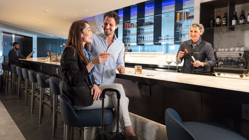 All United Airlines Polaris lounges include a tender bar with premium wines and cocktail at the ready.