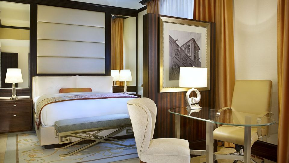 Rooms are elegantly furnished, with suites featuring their own private pool.