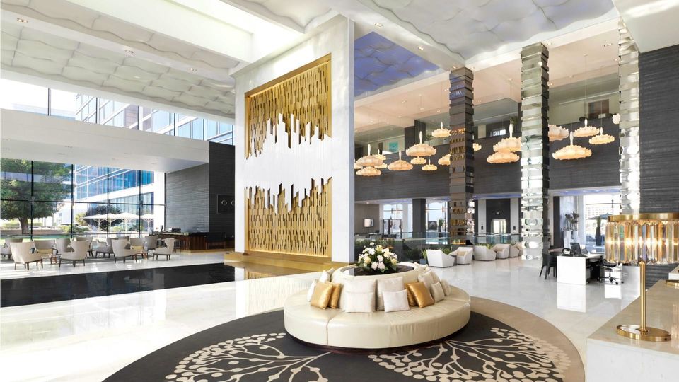 Fairmont Bab Al Bahr features a grand lobby greeting guests.
