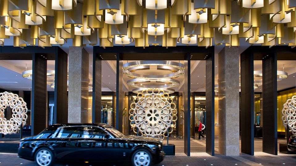 The hotel's grand entrance hints at the opulence that awaits inside.