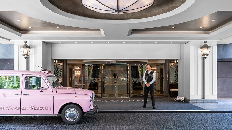 The Langham's pink taxi is an iconic sight regularly spotted amid the bustling city streets.