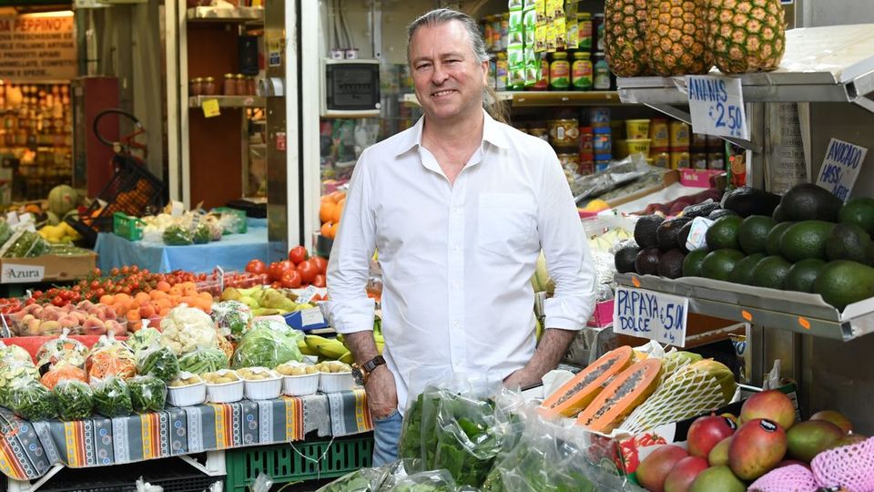 Chef Neil Perry in his element amid the fresh produce of Rome.