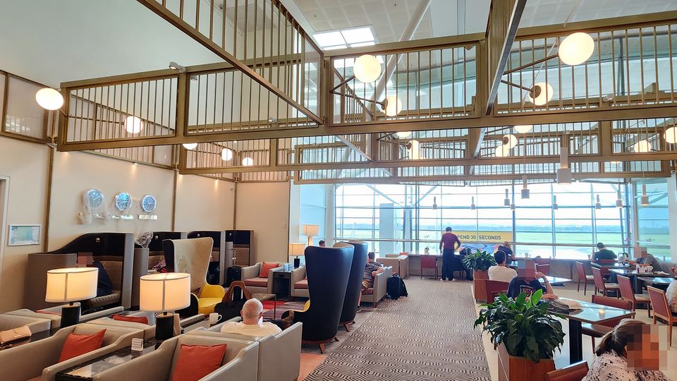 The lounge is perched overlooking the main departures area.