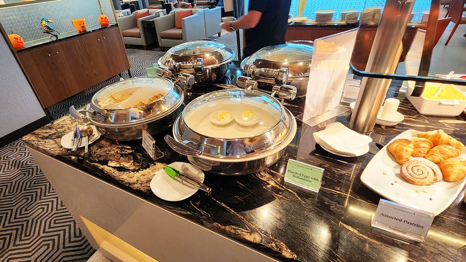 Breakfast includes hot and cold buffet items, such as granola, fresh fruit and pastries.