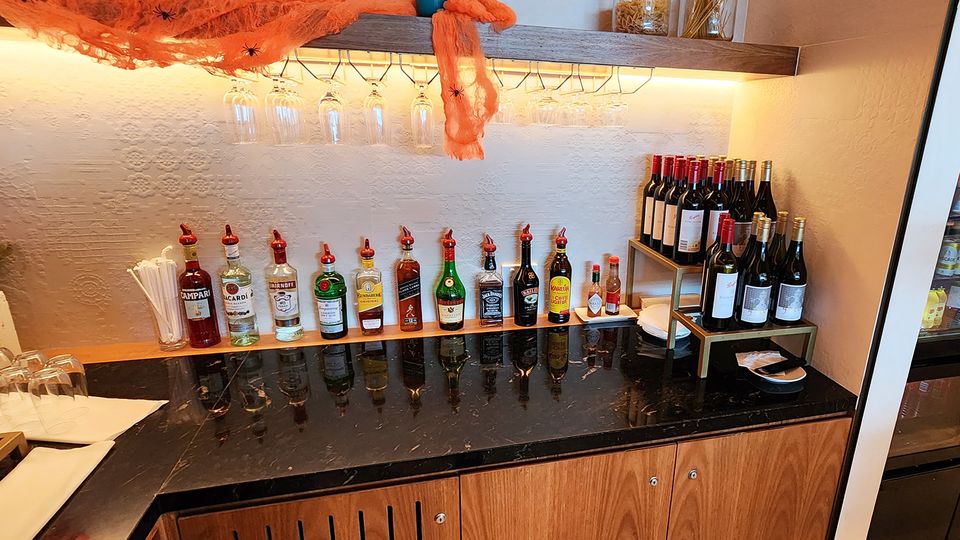 Self-service drinks (and Halloween decorations) including a range of spirits and wines, plus juice, tea and coffee.