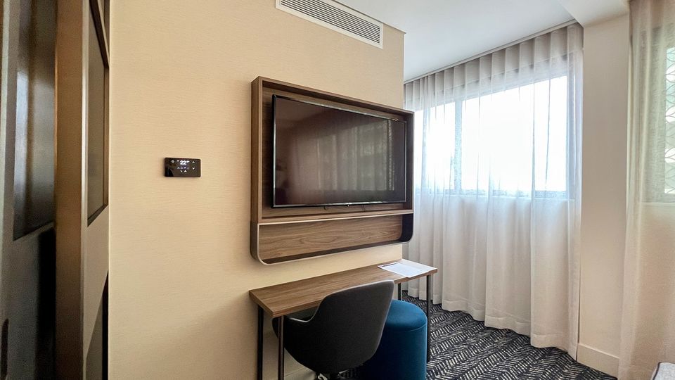 The desk is a nice addition, but too narrow to be of much use.