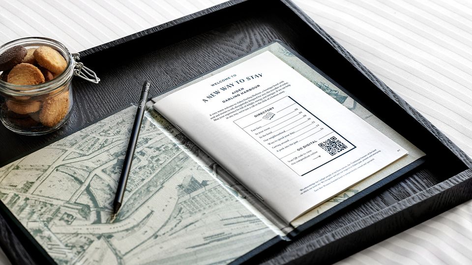 A physical and digital compendium reveals local dining and sightseeing recommendations.