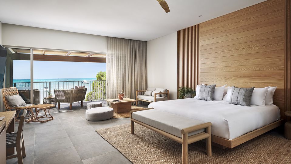 Available on the ground or upper floor, Signature Beachfront Rooms are the star of the show.