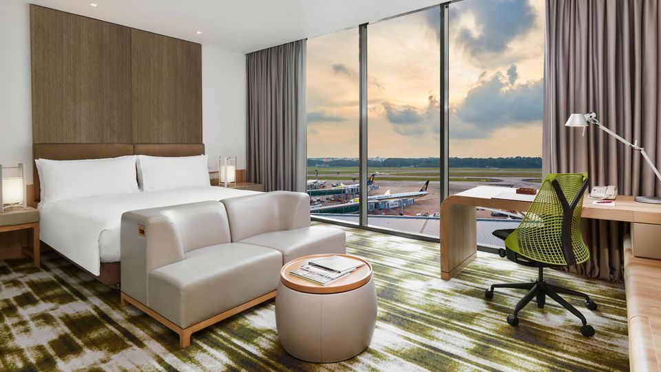 A room with a runway view at the Crowne Plaza Changi Airport.