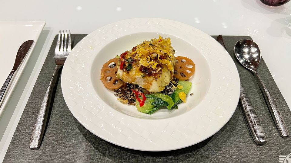 Pan grilled Thai sea bass on a bed of wild rice, steamed pak choy and lotus root.
