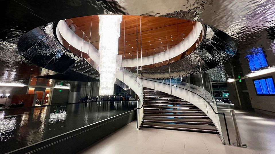 The sweeping Q-shaped staircase leads up to flagship restaurant Al Mourjan Dining.