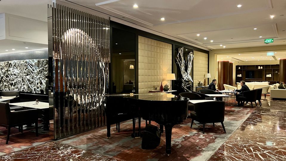 Meet colleagues or friends at one of many tables or lounges in the lobby.