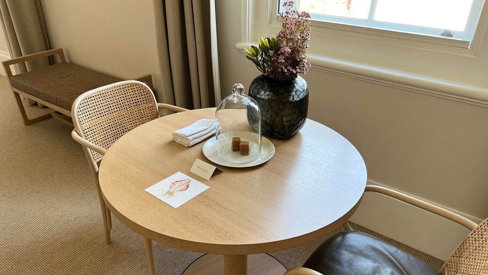 The two-person dining table makes an ideal spot for in-room dining.
