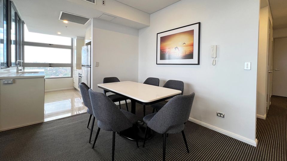 Two power points are conveniently located beside the dining table.