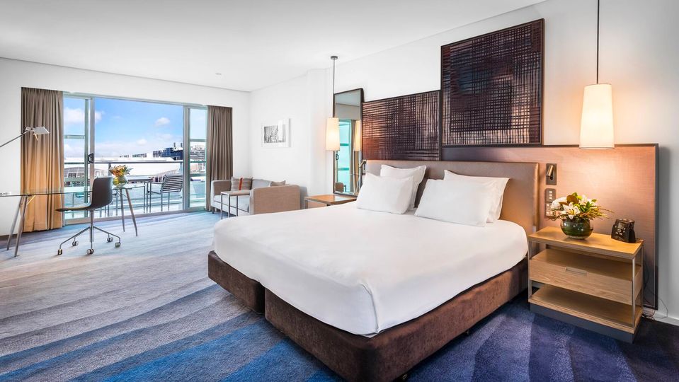 Stretch out in the spacious King Deluxe Harbour View Room.