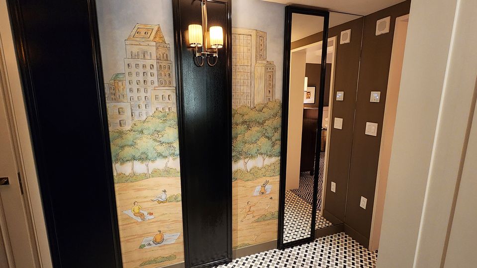 The murals set a playful tone on entering the room.