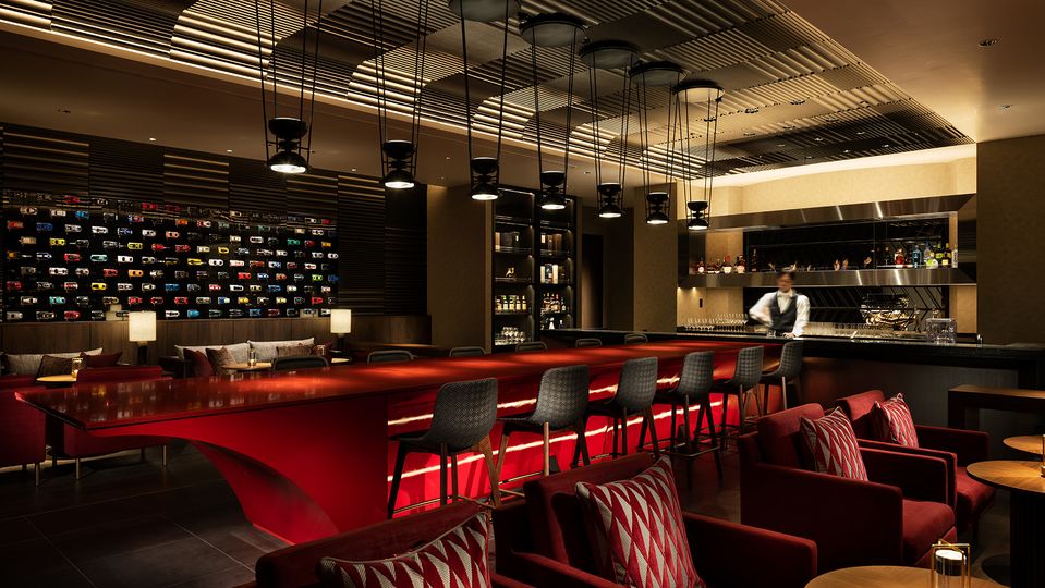 In addition to a fully stocked bar, Bar 4563 has plenty of nods to its high-octane location.