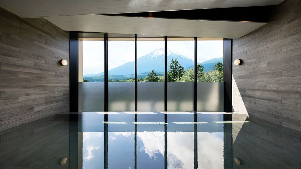 Soak and savour the view of Mount Fuji.
