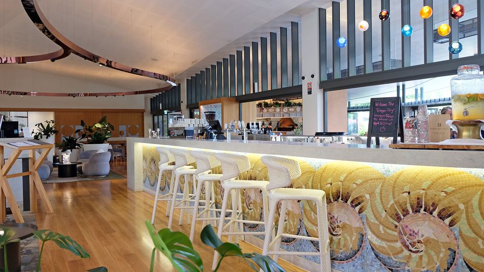 The bar is located adjacent to the lobby.